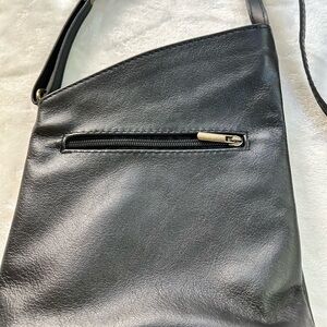 Bought in Florence Italy. Handbag is 100% genuine leather. 44” on handles.